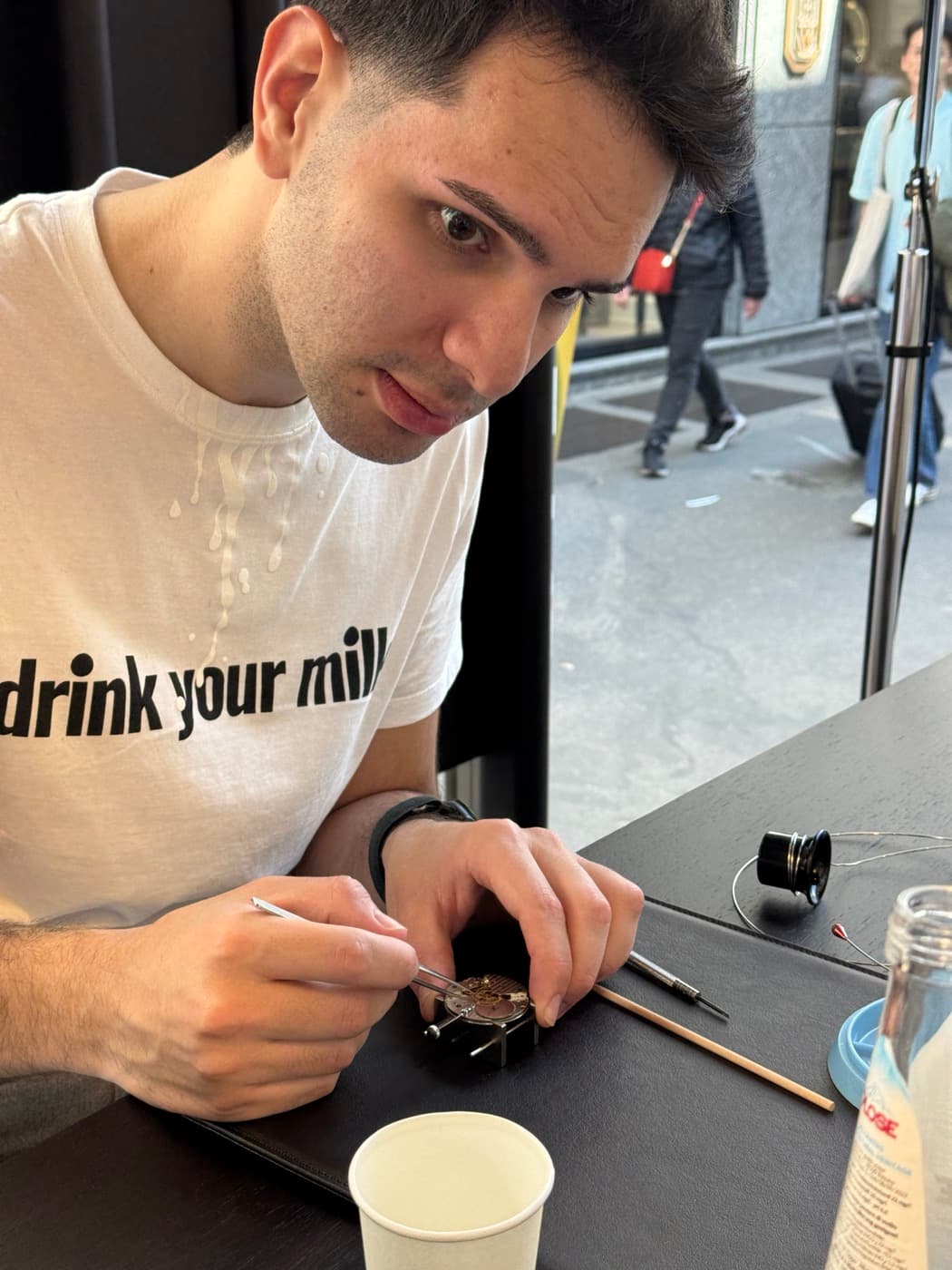 Federico working on the movement of a mechanical watch